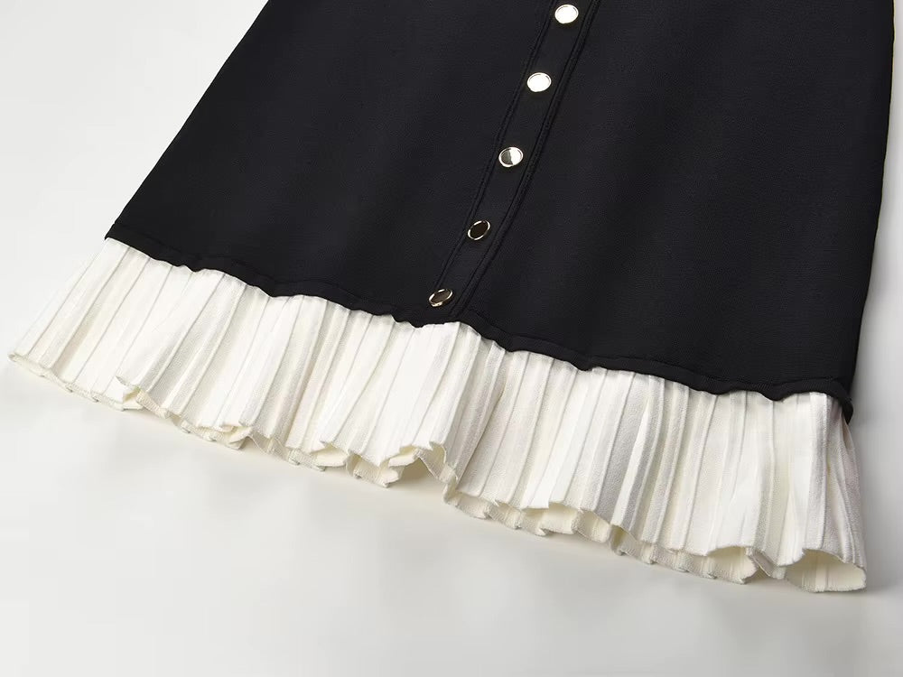 La Robe Parisienne — Knit Mini Dress in Black with White Pleated Hem
