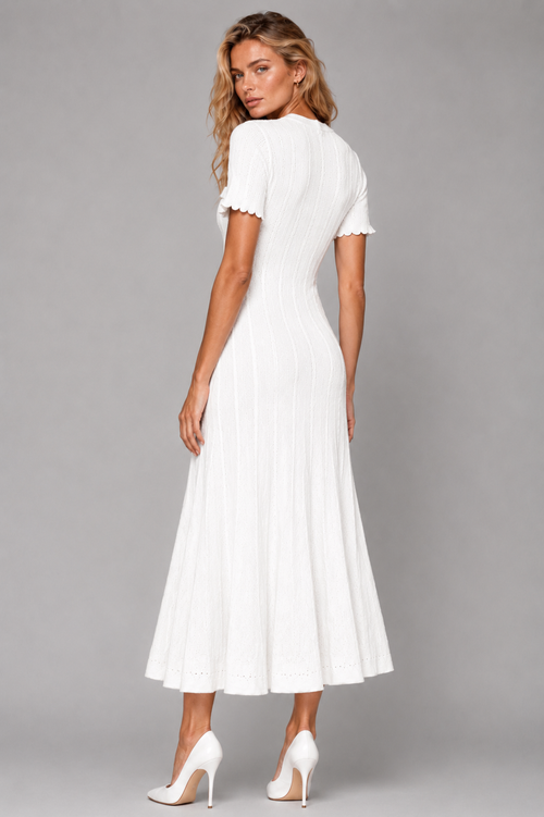 La Robe Câline — Robe midi en tricot torsadé boutonnée sur le devant