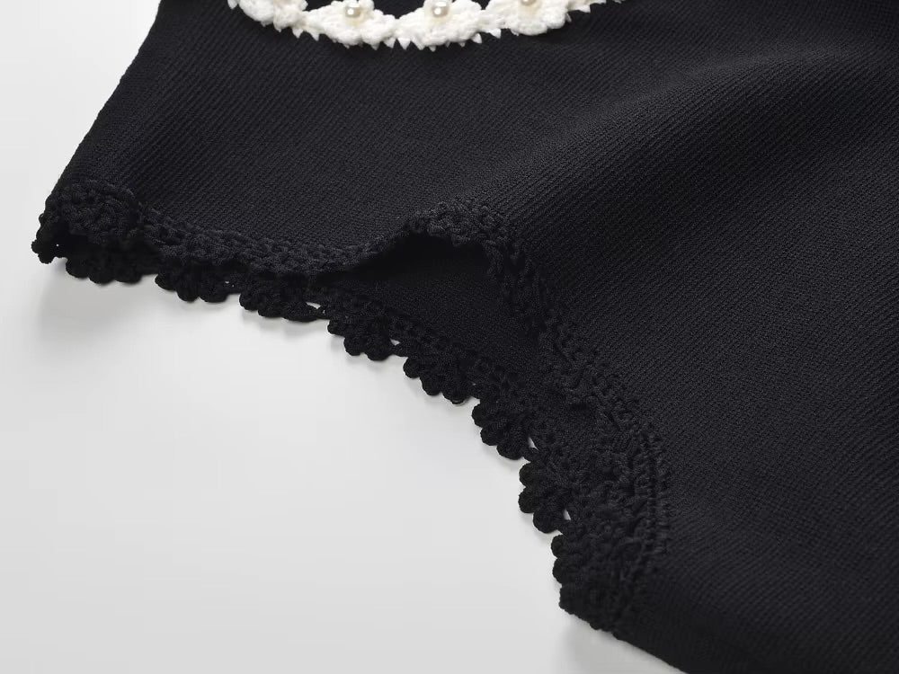 La Robe Pâquerette — gehäkeltes, perlenbesetztes Strick-Maxikleid in Schwarz